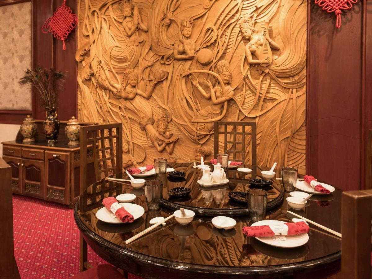 Hotel Mercure Alger Aeroport Dar el Beïda Exterior foto A table set for dim sum