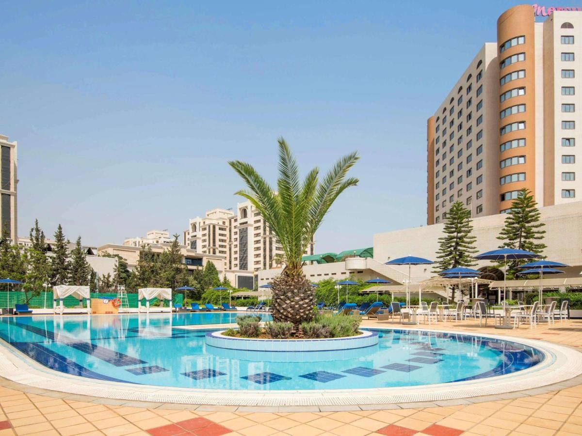 Hotel Mercure Alger Aeroport Dar el Beïda Exterior foto The pool at the hotel